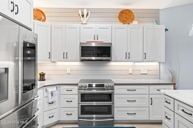 Welcome Home! Experience luxury living in this upgraded townhome on South Harbour Golf Links in North Carolina - for sale on GolfHomes.com, golf home, golf lot