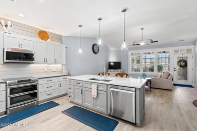 Welcome Home! Experience luxury living in this upgraded townhome on South Harbour Golf Links in North Carolina - for sale on GolfHomes.com, golf home, golf lot