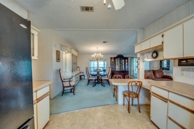 This furnished home is waiting for you to make it yours!   This on Pine Lakes Country Club in Florida - for sale on GolfHomes.com, golf home, golf lot