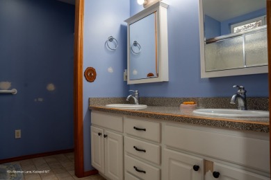 Welcome to this lovely ranch style home located in the center of on Village Greens Golf Club in Montana - for sale on GolfHomes.com, golf home, golf lot