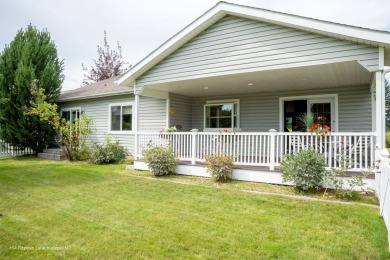 Welcome to this lovely ranch style home located in the center of on Village Greens Golf Club in Montana - for sale on GolfHomes.com, golf home, golf lot