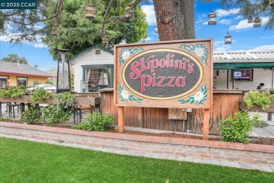 A charming two-story townhouse in Clayton's sought-after on Oakhurst Country Club in California - for sale on GolfHomes.com, golf home, golf lot