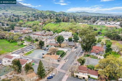 A charming two-story townhouse in Clayton's sought-after on Oakhurst Country Club in California - for sale on GolfHomes.com, golf home, golf lot