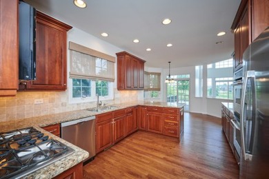 Don't miss out on this spectacular 5-bedroom, 4.5-bathroom home on Hawthorn Woods Country Club in Illinois - for sale on GolfHomes.com, golf home, golf lot