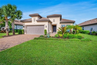 This home, overlooking a peaceful lake, is located in one of on Esplanade Golf and  Country Club in Florida - for sale on GolfHomes.com, golf home, golf lot