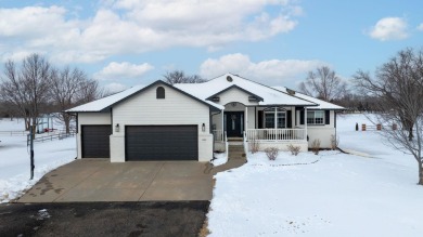 This stunning 4-bedroom, 3-bathroom ranch home with a 3-car on Pine Bay Golf Course in Kansas - for sale on GolfHomes.com, golf home, golf lot