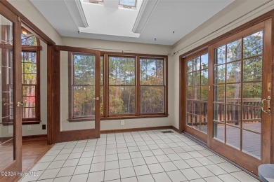 Situated in a premier gated community on a quiet cul-de-sac on Pinewild Country Club of Pinehurst in North Carolina - for sale on GolfHomes.com, golf home, golf lot