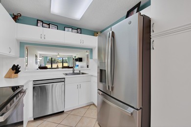 Experience easy living in this beautifully maintained 2-bedroom on Forest Oaks Golf Club in Florida - for sale on GolfHomes.com, golf home, golf lot