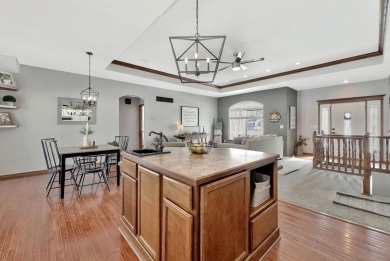 This stunning 4-bedroom, 3-bathroom ranch home with a 3-car on Pine Bay Golf Course in Kansas - for sale on GolfHomes.com, golf home, golf lot