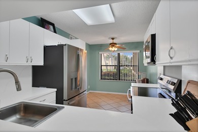 Experience easy living in this beautifully maintained 2-bedroom on Forest Oaks Golf Club in Florida - for sale on GolfHomes.com, golf home, golf lot