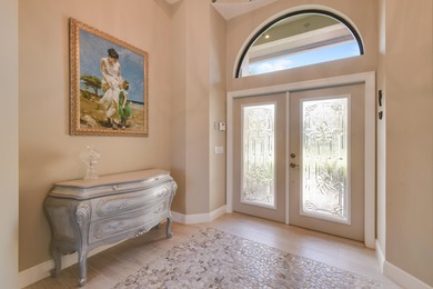 Tucked along the 17th hole of the River Ridge Course, this on Harbour Ridge Yacht and Country Club in Florida - for sale on GolfHomes.com, golf home, golf lot