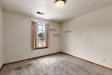 Well maintained Northeast Heights townhome on a low traffic on Arroyo Del Oso Golf Course in New Mexico - for sale on GolfHomes.com, golf home, golf lot