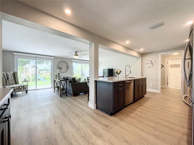 **THIS PROPERTY HAS FLOOD DAMAGE FROM HURRICANE HELENE** CASH on Mangrove Bay Golf Course in Florida - for sale on GolfHomes.com, golf home, golf lot