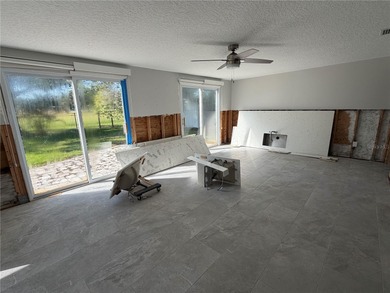 **THIS PROPERTY HAS FLOOD DAMAGE FROM HURRICANE HELENE** CASH on Mangrove Bay Golf Course in Florida - for sale on GolfHomes.com, golf home, golf lot