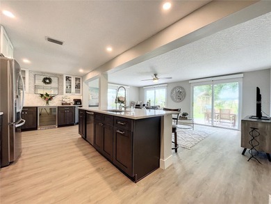 **THIS PROPERTY HAS FLOOD DAMAGE FROM HURRICANE HELENE** CASH on Mangrove Bay Golf Course in Florida - for sale on GolfHomes.com, golf home, golf lot