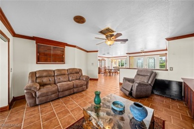 Charming 3BR/3BA Home with Golf & Lake Views - Prime Location! on Spanish Wells Golf and Country Club in Florida - for sale on GolfHomes.com, golf home, golf lot