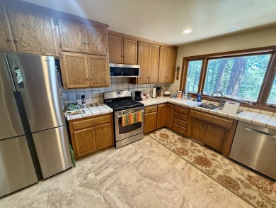 Majestic Mountain Retreat in Lake Almanor West! Nestled just on Lake Almanor West Golf Course in California - for sale on GolfHomes.com, golf home, golf lot