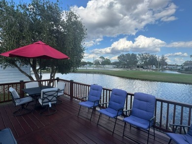 This home has so much to offer it's hard to even decide where to on Golden Lakes Golf Course in Florida - for sale on GolfHomes.com, golf home, golf lot