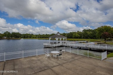 A Greenbriar model where access to the front door entrance is on Greenbriar Woodlands in New Jersey - for sale on GolfHomes.com, golf home, golf lot