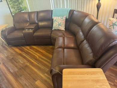 This home has so much to offer it's hard to even decide where to on Golden Lakes Golf Course in Florida - for sale on GolfHomes.com, golf home, golf lot