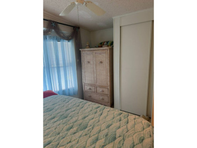 This home has so much to offer it's hard to even decide where to on Golden Lakes Golf Course in Florida - for sale on GolfHomes.com, golf home, golf lot