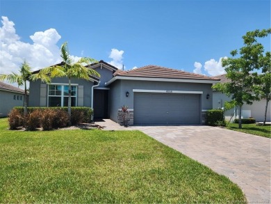 This like-new 3/2/2 home in Jensen Beach offers a perfect blend on Eagle Marsh Golf Club in Florida - for sale on GolfHomes.com, golf home, golf lot