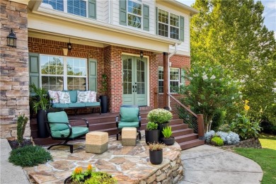 Price to move, this custom-built home sits on a roundabout on Hampton Golf Village in Georgia - for sale on GolfHomes.com, golf home, golf lot