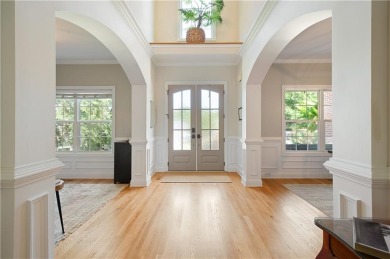 Price to move, this custom-built home sits on a roundabout on Hampton Golf Village in Georgia - for sale on GolfHomes.com, golf home, golf lot