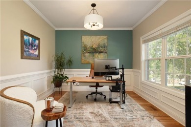 Price to move, this custom-built home sits on a roundabout on Hampton Golf Village in Georgia - for sale on GolfHomes.com, golf home, golf lot