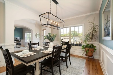 Price to move, this custom-built home sits on a roundabout on Hampton Golf Village in Georgia - for sale on GolfHomes.com, golf home, golf lot