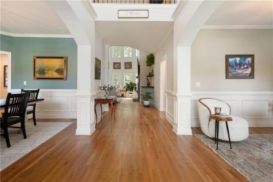 Price to move, this custom-built home sits on a roundabout on Hampton Golf Village in Georgia - for sale on GolfHomes.com, golf home, golf lot