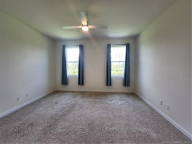 This like-new 3/2/2 home in Jensen Beach offers a perfect blend on Eagle Marsh Golf Club in Florida - for sale on GolfHomes.com, golf home, golf lot