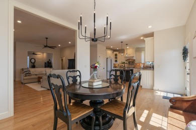 This stunning all-brick and stone home in the prestigious on Rivercut Golf Course in Missouri - for sale on GolfHomes.com, golf home, golf lot