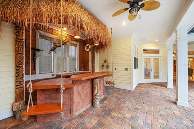 Welcome to this expansive 4-bedroom, 4-bathroom home with over 4 on Haile Plantation Golf and Country Club in Florida - for sale on GolfHomes.com, golf home, golf lot