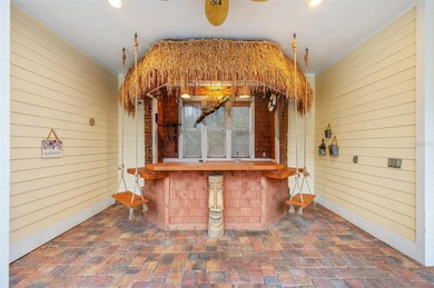 Welcome to this expansive 4-bedroom, 4-bathroom home with over 4 on Haile Plantation Golf and Country Club in Florida - for sale on GolfHomes.com, golf home, golf lot