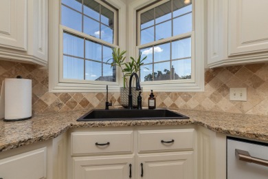 This stunning all-brick and stone home in the prestigious on Rivercut Golf Course in Missouri - for sale on GolfHomes.com, golf home, golf lot