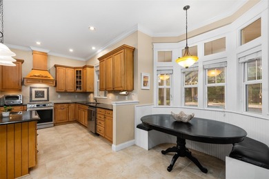 Welcome to this expansive 4-bedroom, 4-bathroom home with over 4 on Haile Plantation Golf and Country Club in Florida - for sale on GolfHomes.com, golf home, golf lot