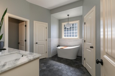 This stunning all-brick and stone home in the prestigious on Rivercut Golf Course in Missouri - for sale on GolfHomes.com, golf home, golf lot