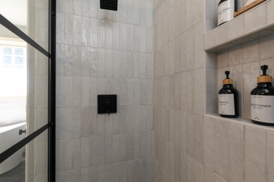 This stunning all-brick and stone home in the prestigious on Rivercut Golf Course in Missouri - for sale on GolfHomes.com, golf home, golf lot