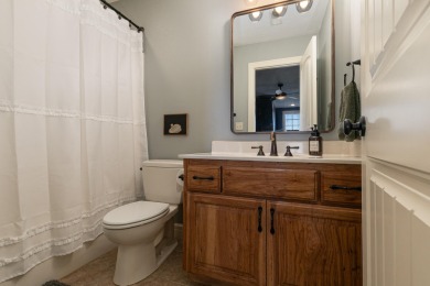 This stunning all-brick and stone home in the prestigious on Rivercut Golf Course in Missouri - for sale on GolfHomes.com, golf home, golf lot