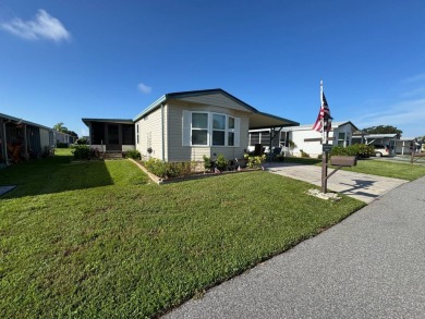 Look no further than this fully renovated, well-maintained 2b/2b on Lake Henry Golf Club in Florida - for sale on GolfHomes.com, golf home, golf lot