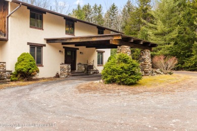 Welcome to Casa Solara -- a custom-built California on Colonial Country Club in New York - for sale on GolfHomes.com, golf home, golf lot
