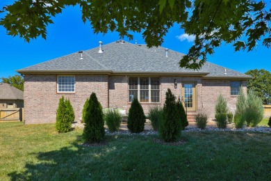 This stunning all-brick and stone home in the prestigious on Rivercut Golf Course in Missouri - for sale on GolfHomes.com, golf home, golf lot