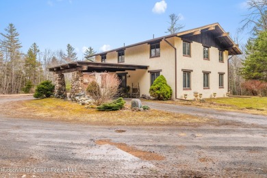 Welcome to Casa Solara -- a custom-built California on Colonial Country Club in New York - for sale on GolfHomes.com, golf home, golf lot