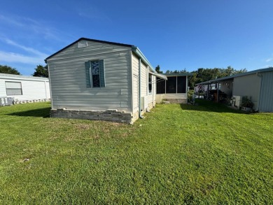 Look no further than this fully renovated, well-maintained 2b/2b on Lake Henry Golf Club in Florida - for sale on GolfHomes.com, golf home, golf lot