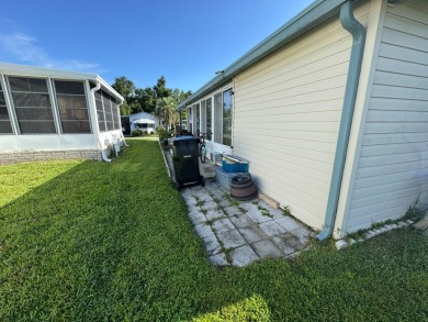 Look no further than this fully renovated, well-maintained 2b/2b on Lake Henry Golf Club in Florida - for sale on GolfHomes.com, golf home, golf lot