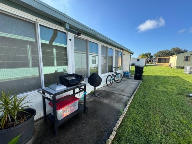 Look no further than this fully renovated, well-maintained 2b/2b on Lake Henry Golf Club in Florida - for sale on GolfHomes.com, golf home, golf lot