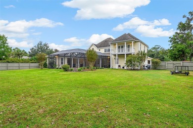 Welcome to this expansive 4-bedroom, 4-bathroom home with over 4 on Haile Plantation Golf and Country Club in Florida - for sale on GolfHomes.com, golf home, golf lot