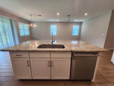 Almost new concrete home w/concrete tile roof in Jensen Beach! on Eagle Marsh Golf Club in Florida - for sale on GolfHomes.com, golf home, golf lot