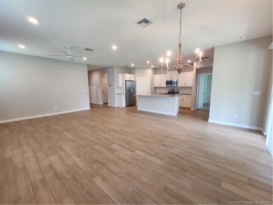 Almost new concrete home w/concrete tile roof in Jensen Beach! on Eagle Marsh Golf Club in Florida - for sale on GolfHomes.com, golf home, golf lot